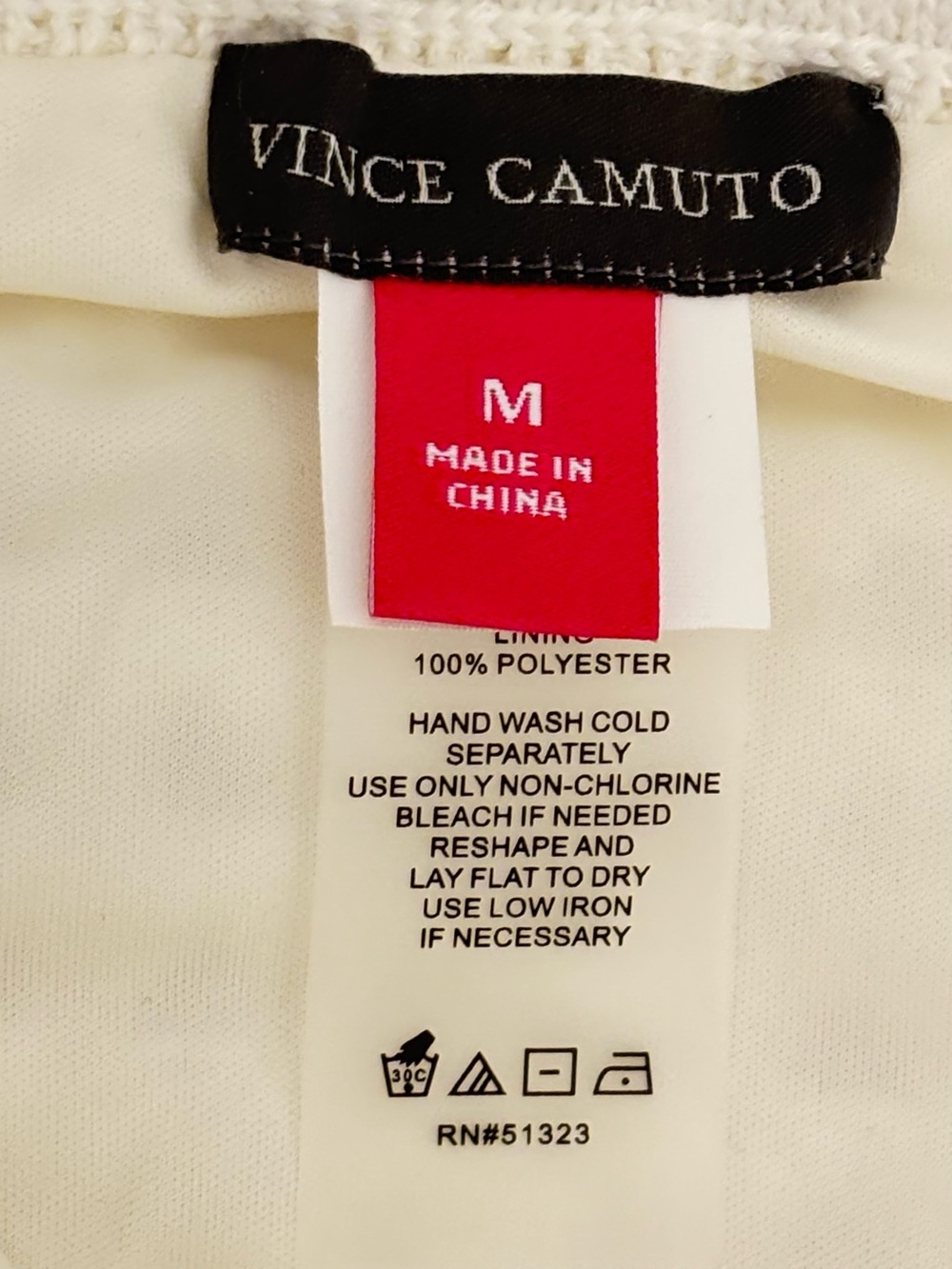 Vince Camuto Cream Top with Black Logo Tag and Red Size Tab